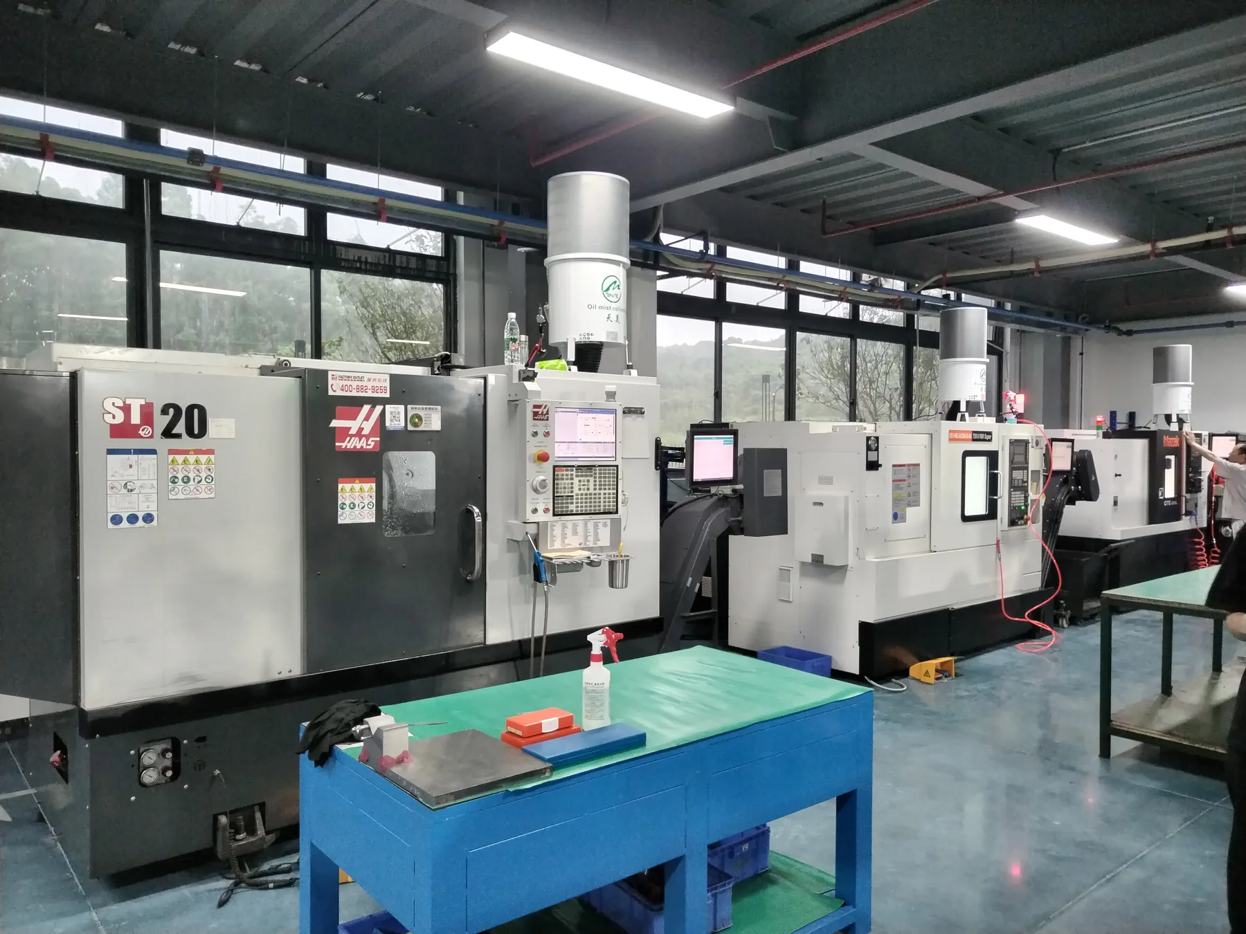 TINME oil mist collector installed on a HAAS ST-20 CNC lathe